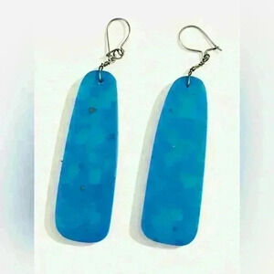 Pair of turquoise resin dangle earrings